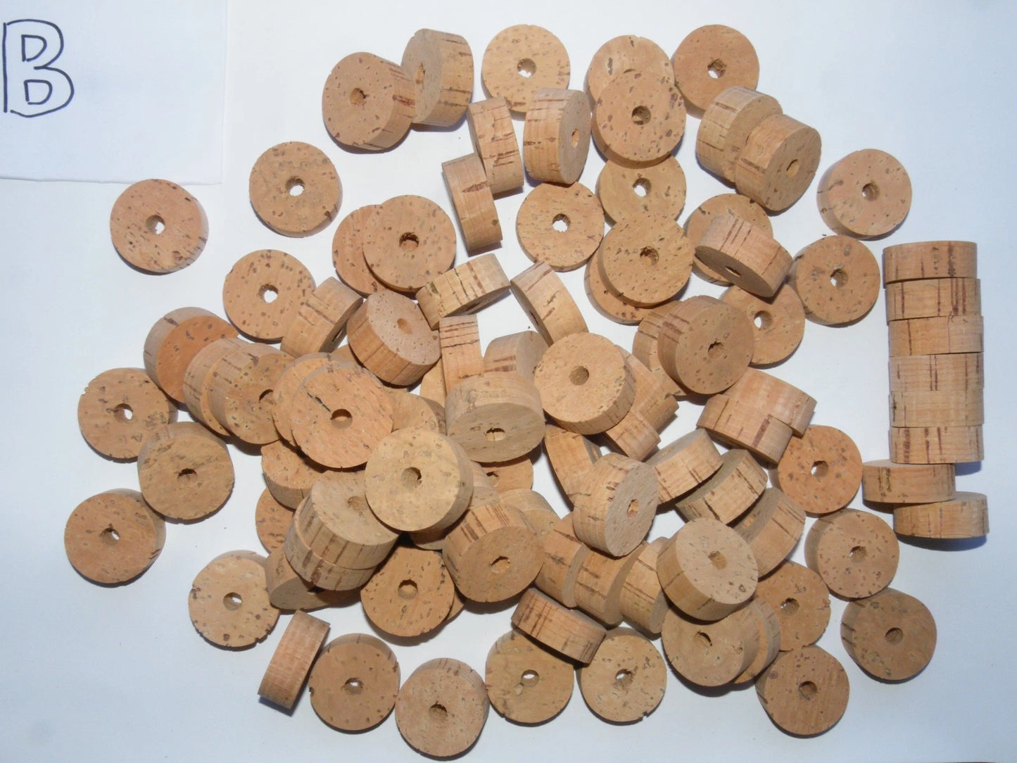 100 CORK RINGS 1 1/4"X1/2" BORE 1/4" GRADE B