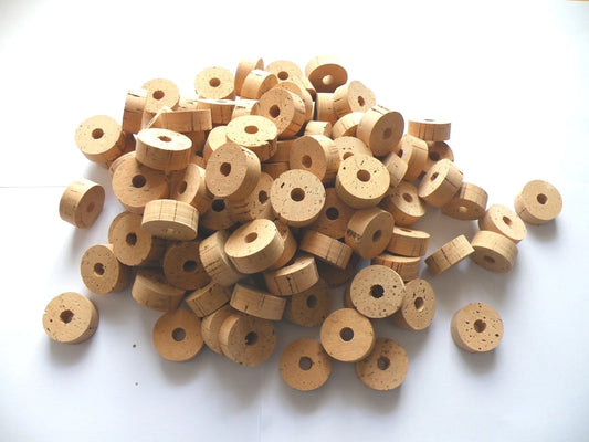 100 CORK RINGS 1 1/4"X1/2" BORE 5/16" GRADE B -