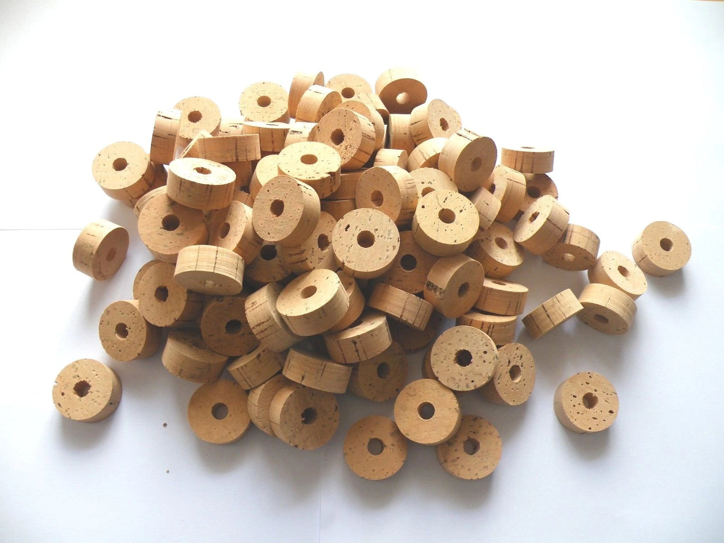100 CORK RINGS 1 1/4"X1/2" BORE 5/16" GRADE B -